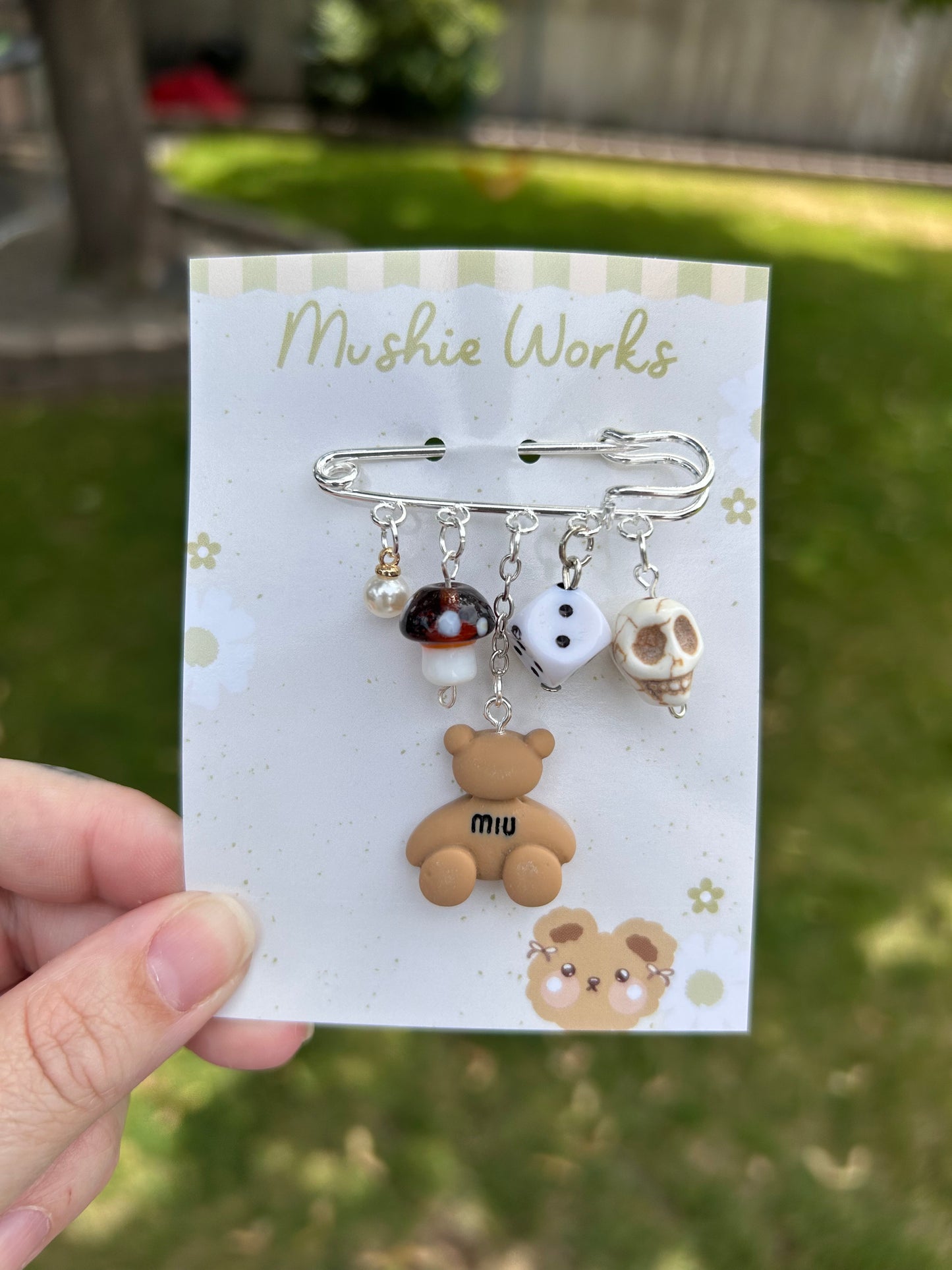 miu miu teddy bear safety pin